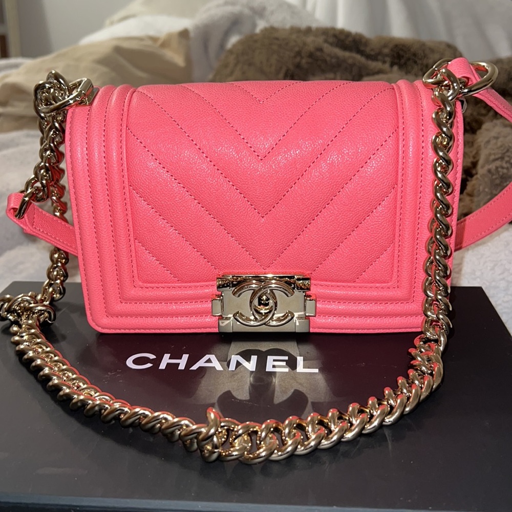 Pink chanel small boy bag.